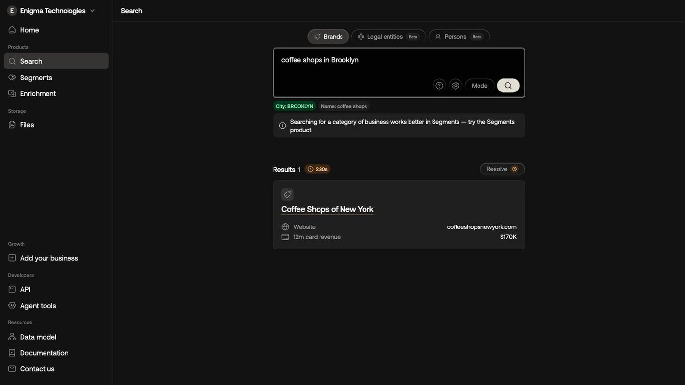 The Enigma console: a search for coffee shops in Brooklyn, parsed into city and name filters, returning a resolved business with its website and twelve-month card revenue.